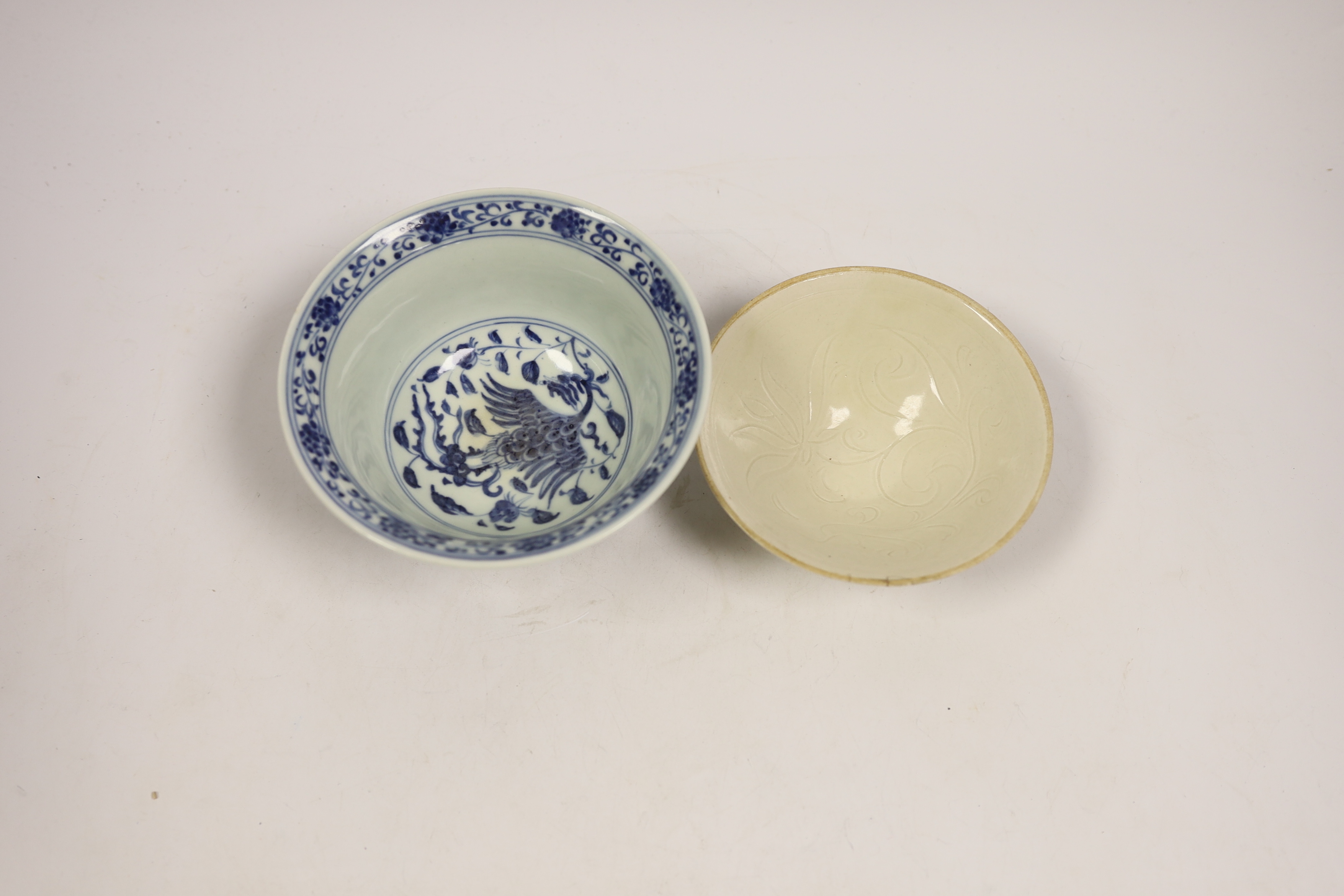 A Chinese blue and white porcelain bowl, Xuande mark but later and another bowl